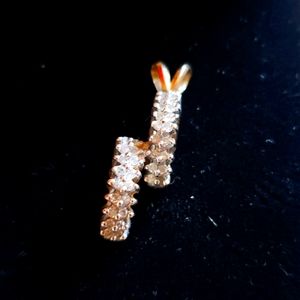Diamond and gold pendant